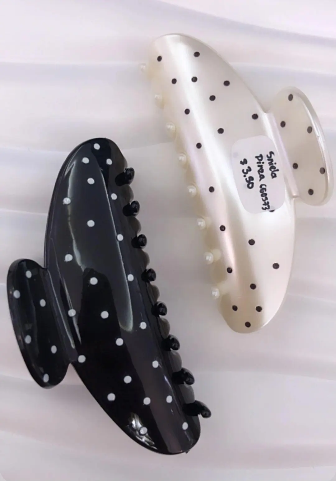 Pinza Polkadots ovalada negra