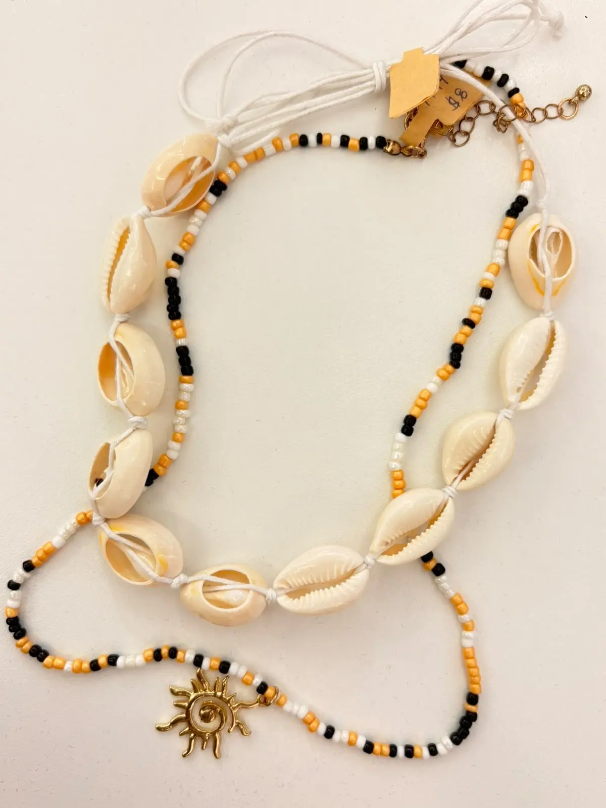 COLLAR PLAYERO DOBLE CONCHAS