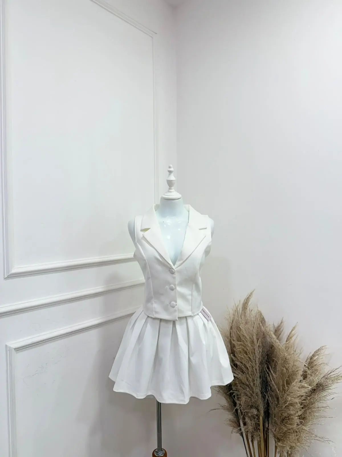 Conjunto chaleco y falda