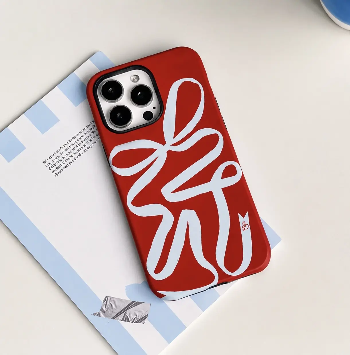 IPHONE CASE 15 PRO MAX DOBLE ROJO LAZO CELESTE