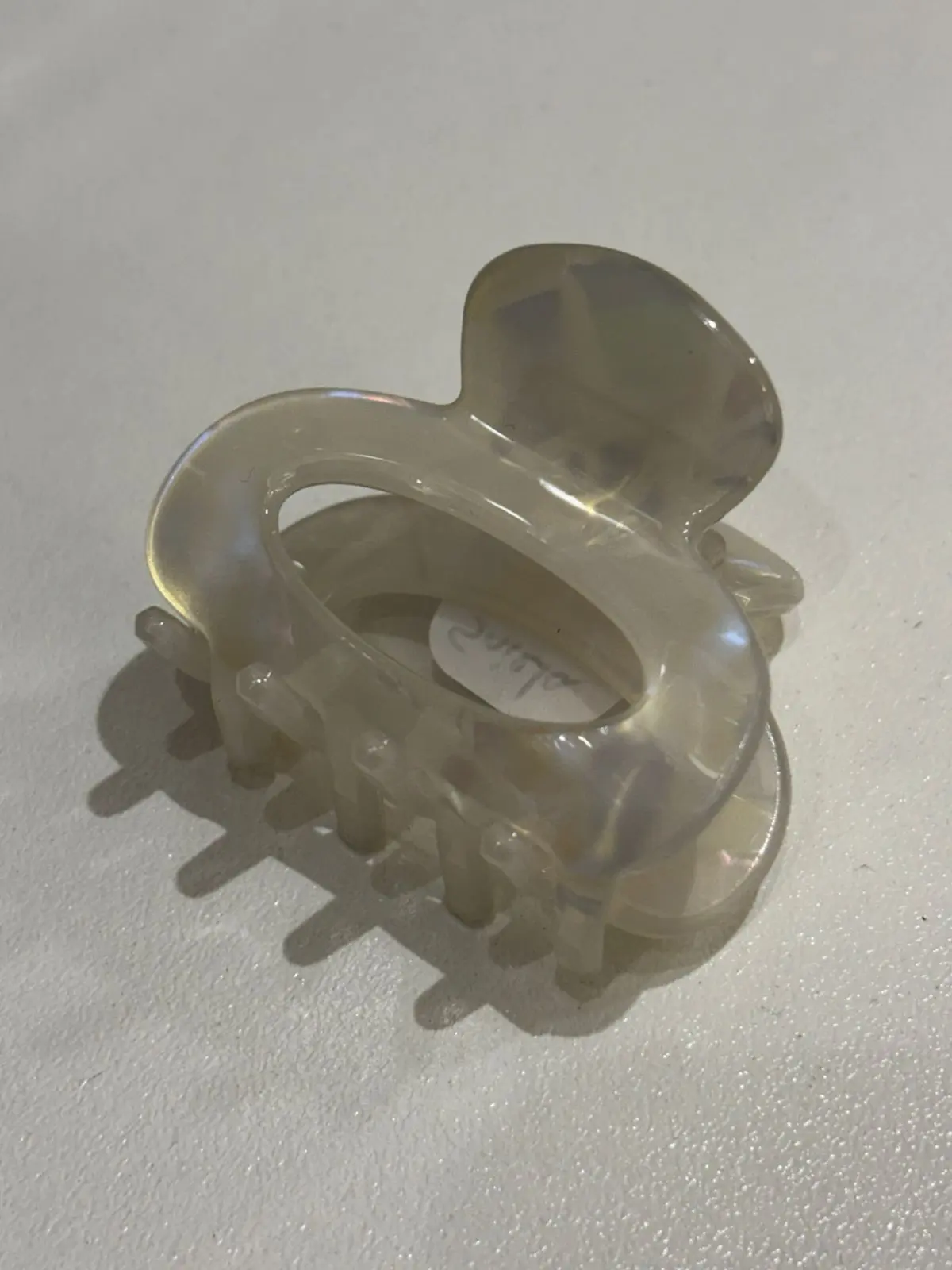 Mini pinza blanca tornasol