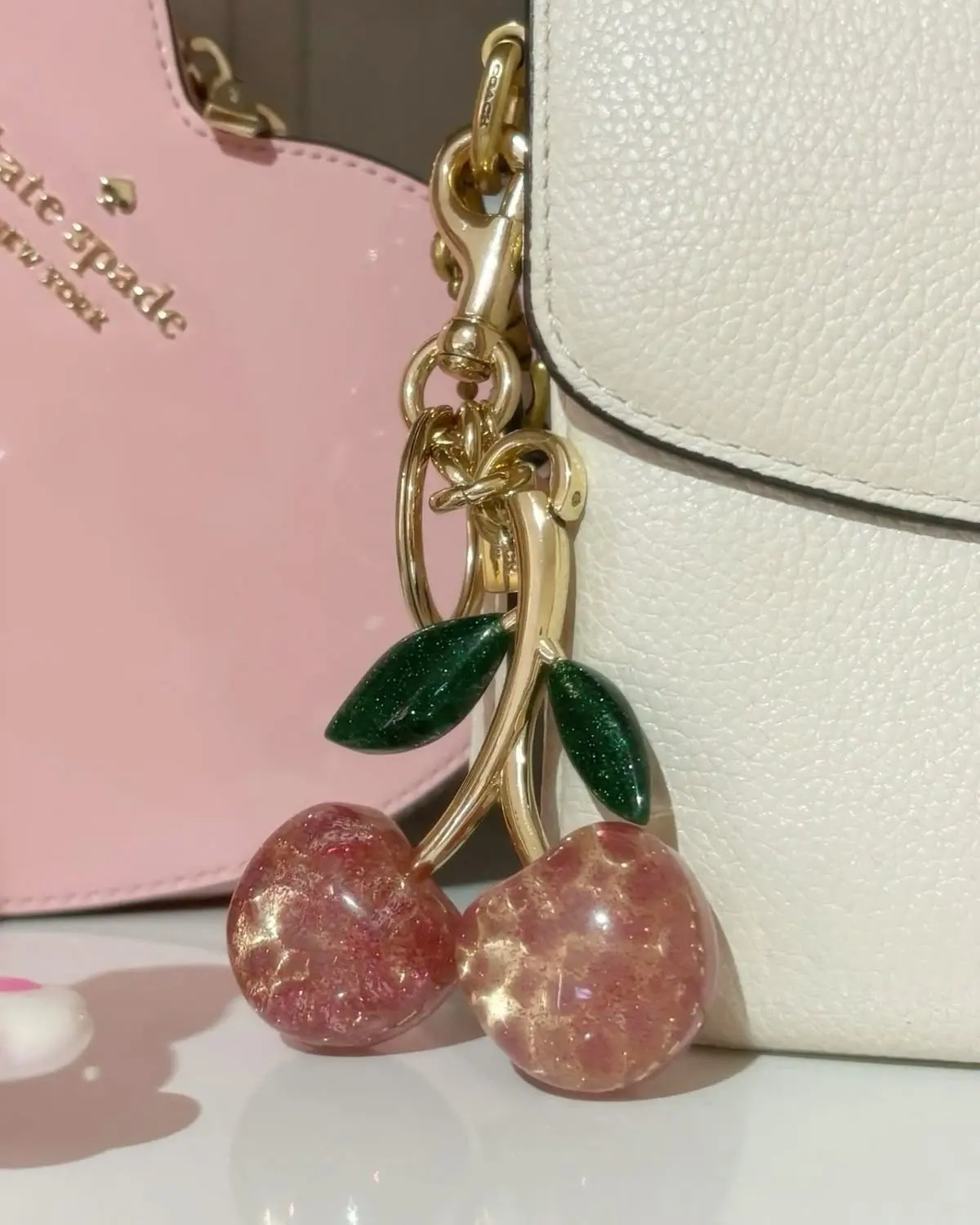 COACH GLITTER CHERRY BAG CHARM