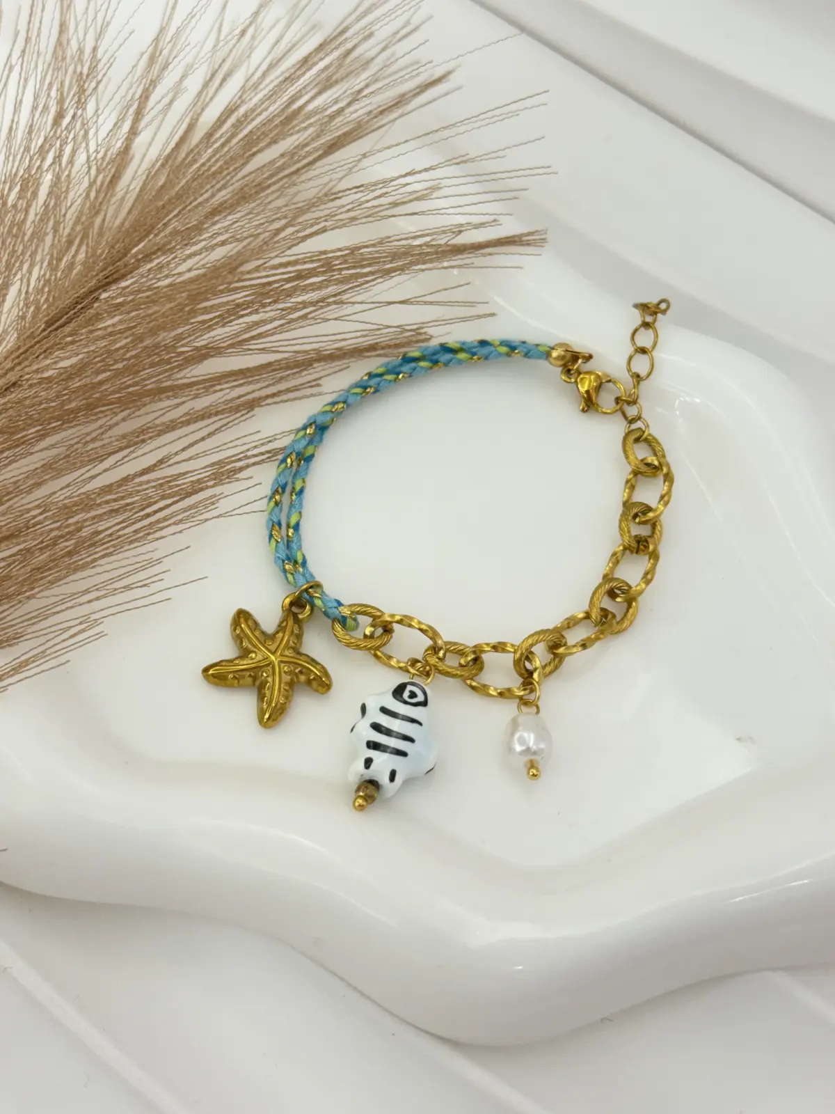 BR00-364 Pulsera dorada mitad cordon pez blanco