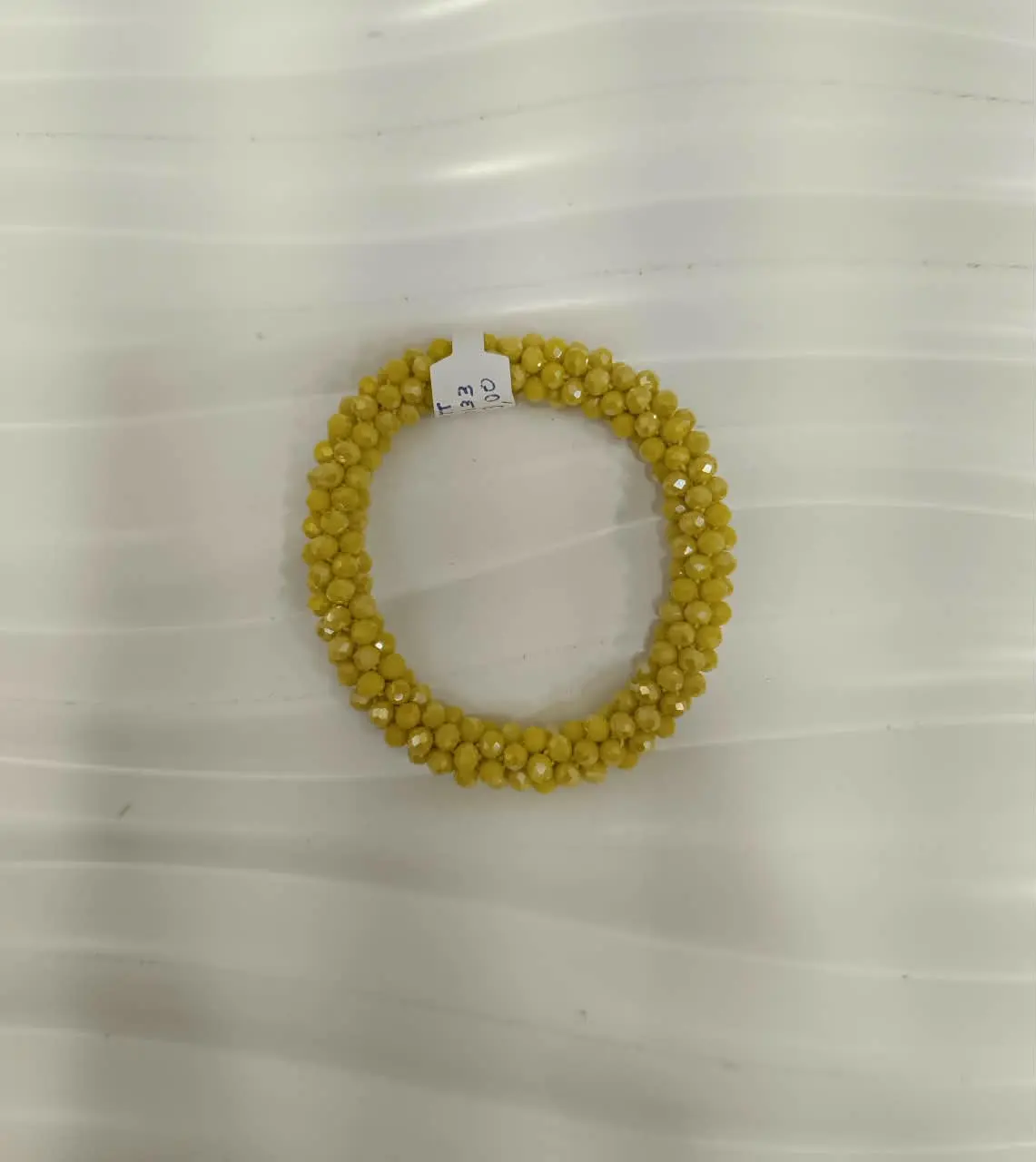PULSERA TRENZA AMARILLA