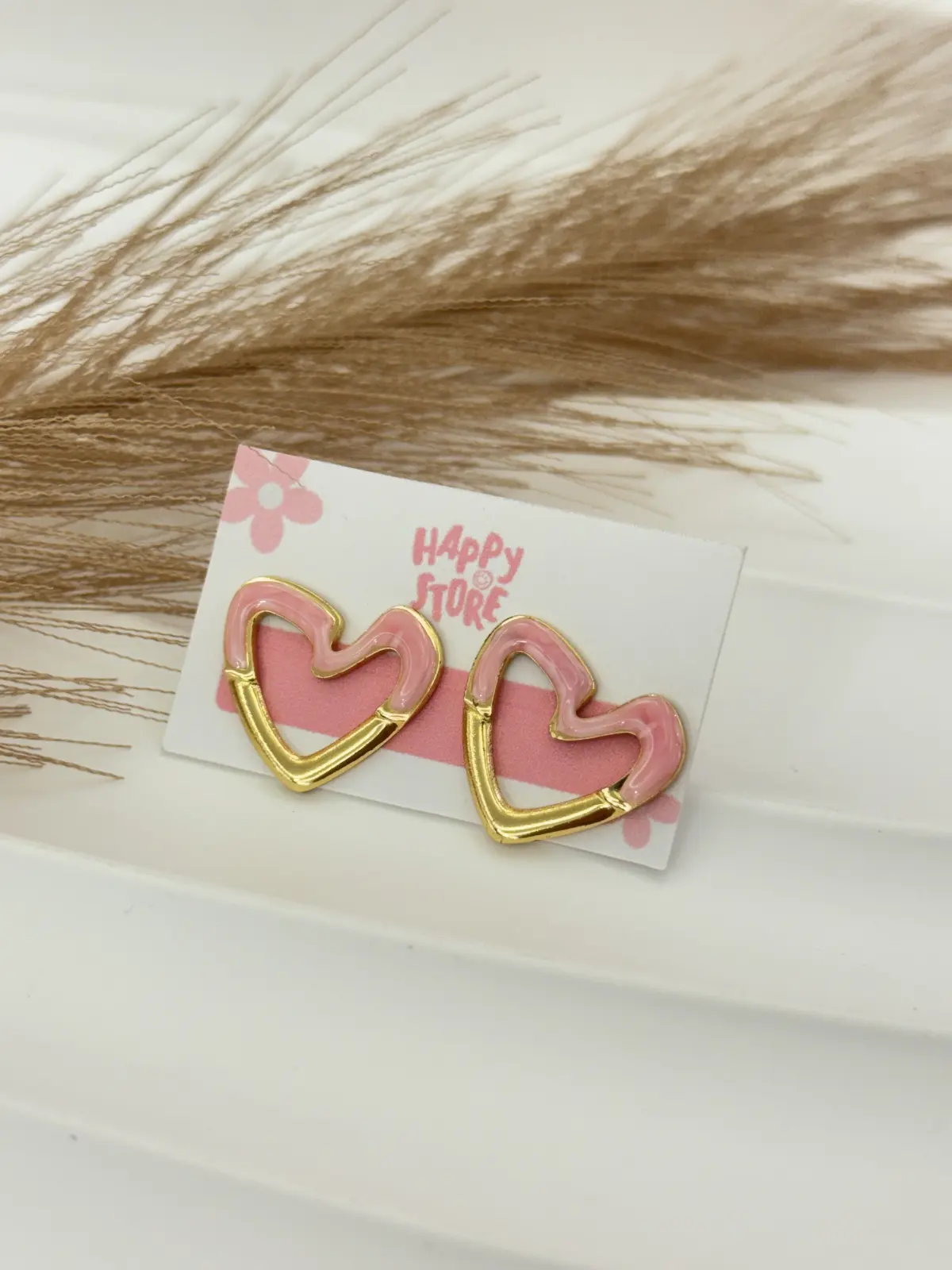 P01-865 Aretes dorados de corazón vacio rosado