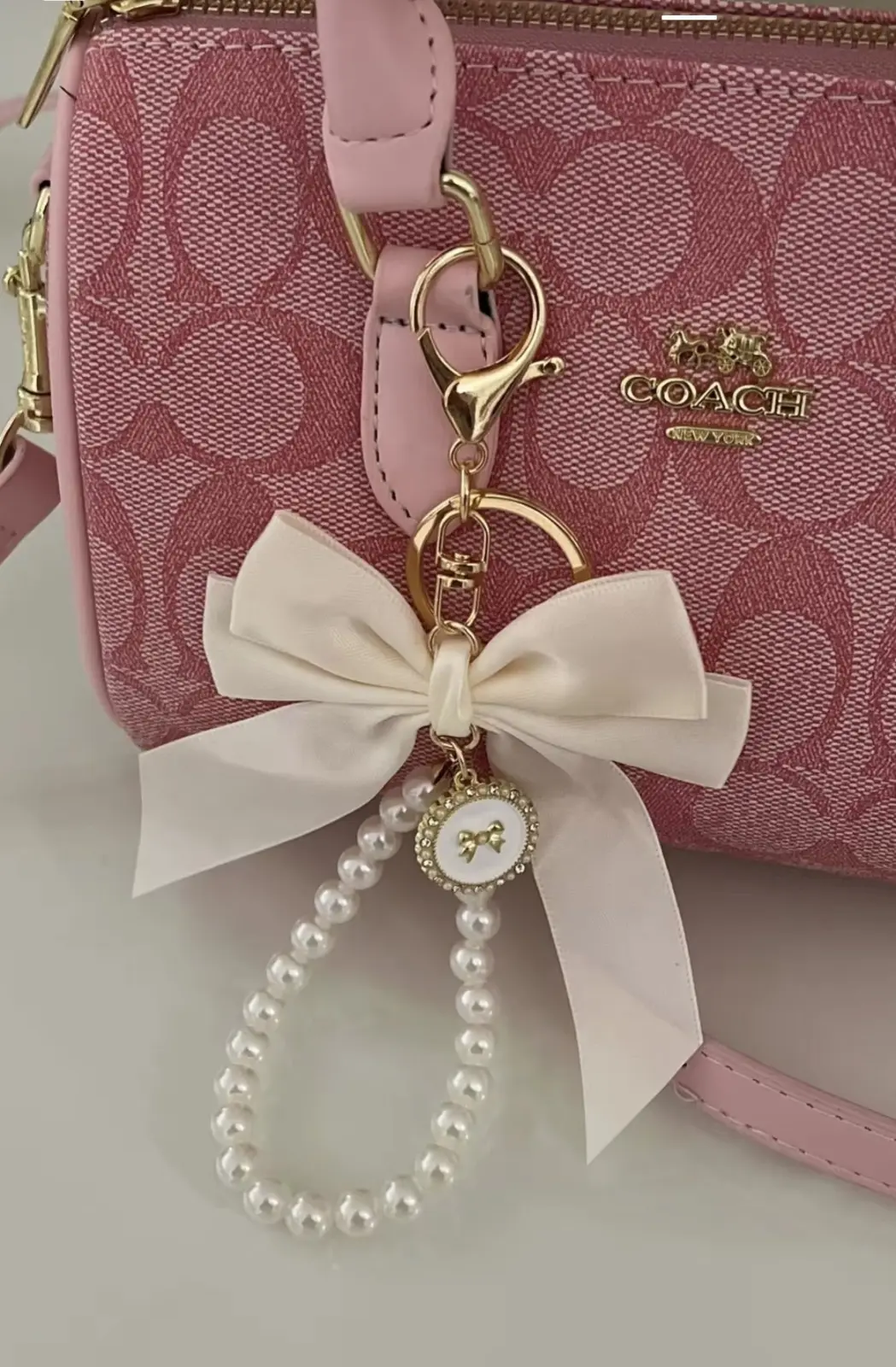 COACH COQUETTE BAG CHARM BLANCO